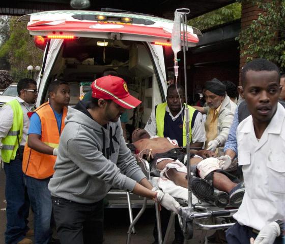 An injured person is brought to the Aga Khan Hospital in Nairobi after an attack at a mall in the Kenyan capital. Please click for a slide show and photos at the Denver Post.
